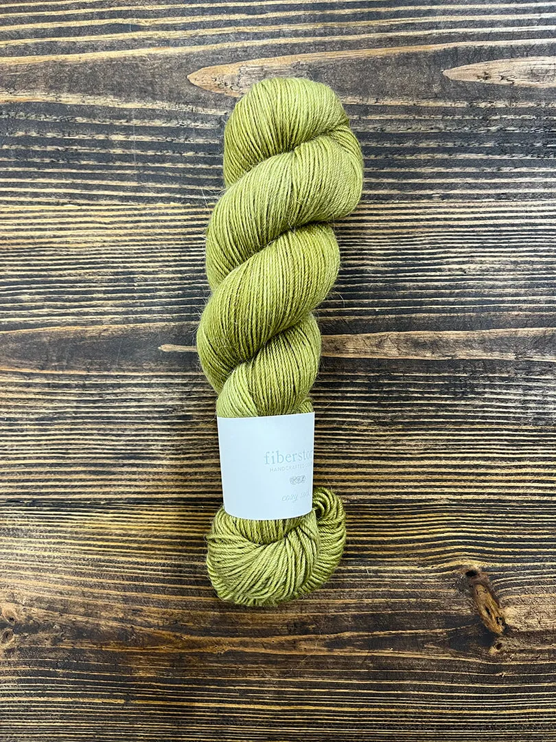 Here is an optimized title for the e-commerce product:

Luxurious Fiberstory Cozy Sock Yarn - Soft, Durable, Hand-Dyed Wool Blend for Knitting & Crochet