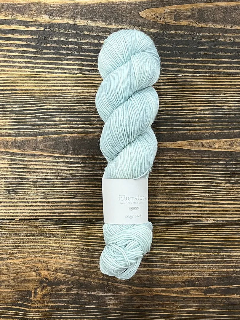 Here is an optimized title for the e-commerce product:

Luxurious Fiberstory Cozy Sock Yarn - Soft, Durable, Hand-Dyed Wool Blend for Knitting & Crochet