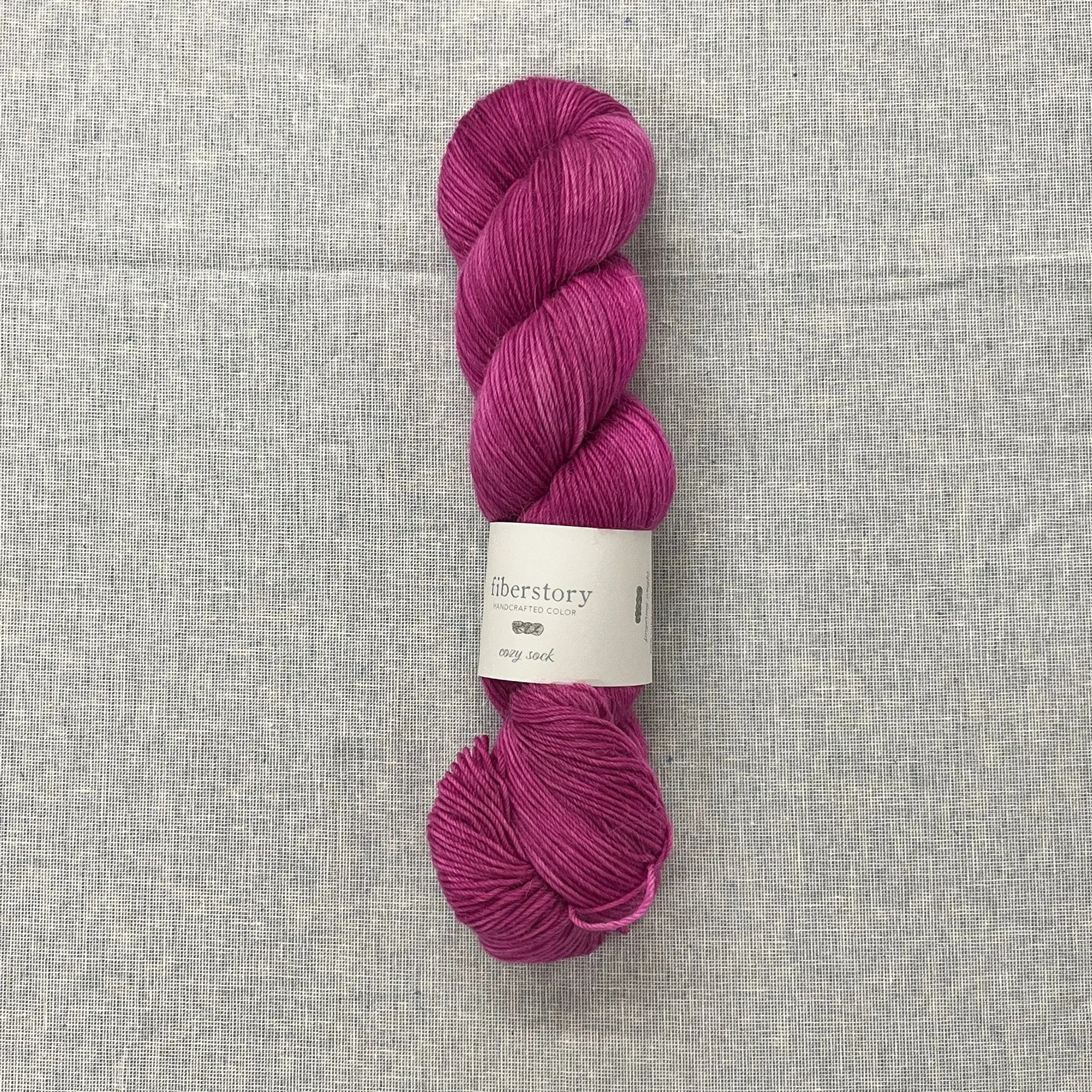 Here is an optimized title for the e-commerce product:

Luxurious Fiberstory Cozy Sock Yarn - Soft, Durable, Hand-Dyed Wool Blend for Knitting & Crochet