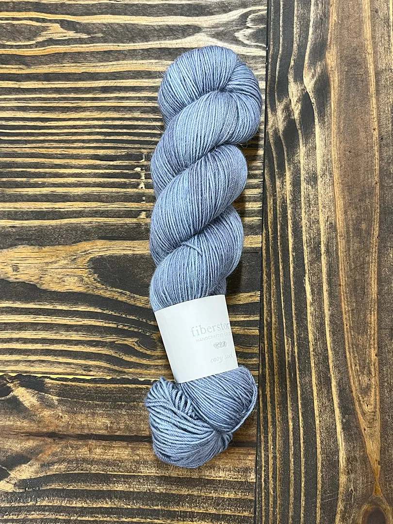 Here is an optimized title for the e-commerce product:

Luxurious Fiberstory Cozy Sock Yarn - Soft, Durable, Hand-Dyed Wool Blend for Knitting & Crochet